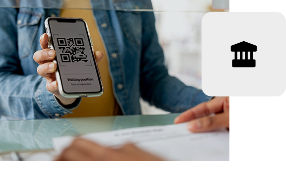 Person scanning a QR code on a smartphone for secure online access