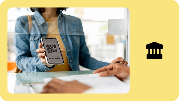 Person holds a smartphone displaying a QR code for digital registration or identification. The image represents digital public services and cloud solutions for the public sector.