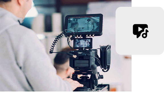 Video production with a professional camera and monitor in a studio.