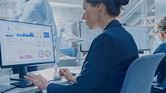 Woman looking at dashboard on screen
